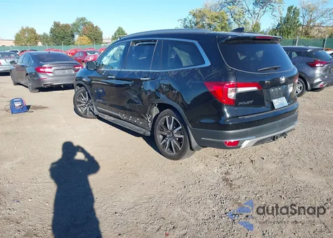 2021 Honda Pilot Awd Touring 8 Passenger z USA, uszkodzony, nr VIN 5FNYF6H94MB044999